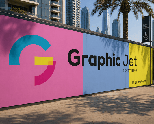 Colorful advertisement board for Graphic Jet Advertising with cityscape in the background