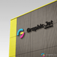 Logo of Graphic Jet on a building facade with a colorful 'G' and yellow accent.