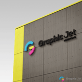 Logo of Graphic Jet on a building facade with a colorful 'G' and yellow accent.