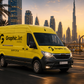 Yellow van with 'Graphic Jet' branding on a Dubai city street with Burj Khalifa in the background